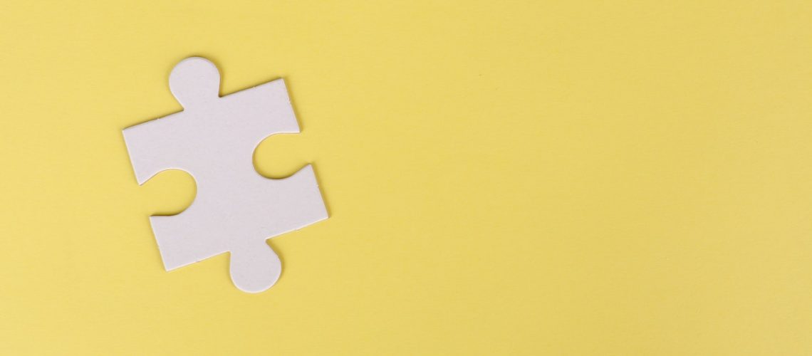 jigsaw-puzzle-on-yellow-background-3482443